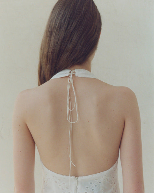 Ivory mini dress with an open back NOVITSKA