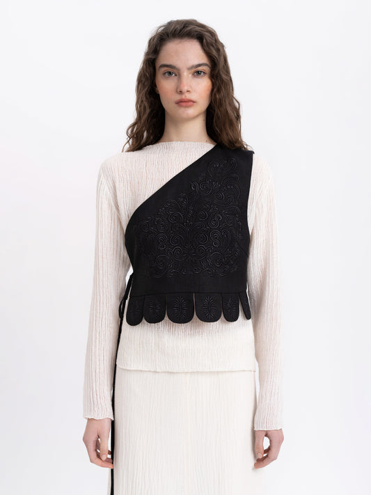 Asymmetric vest with black embroidery in tone Osiayna ETNODIM