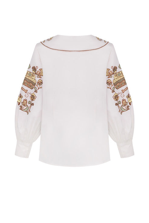 "Embroidery history" white blouse with colourful embroidery  FOBERINI