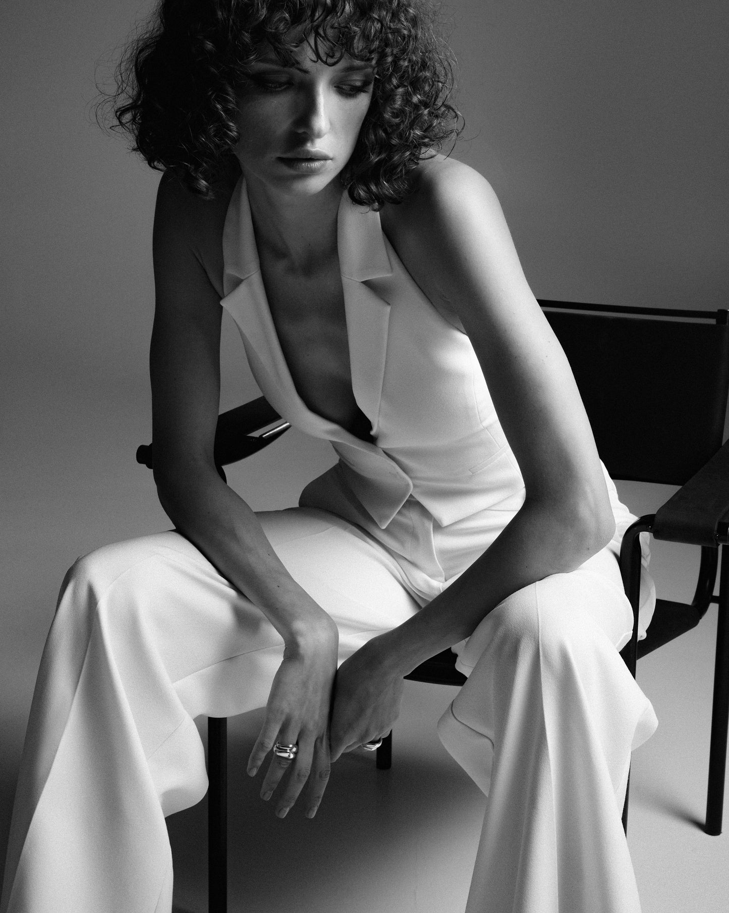 Ivory vest with an open back NOVITSKA