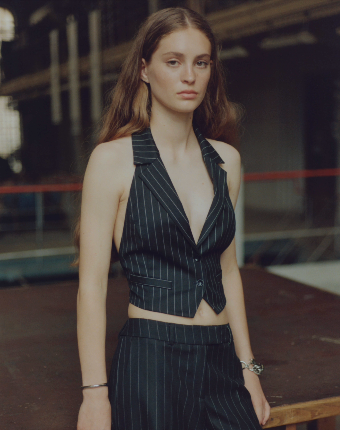 Black striped vest with an open back NOVITSKA