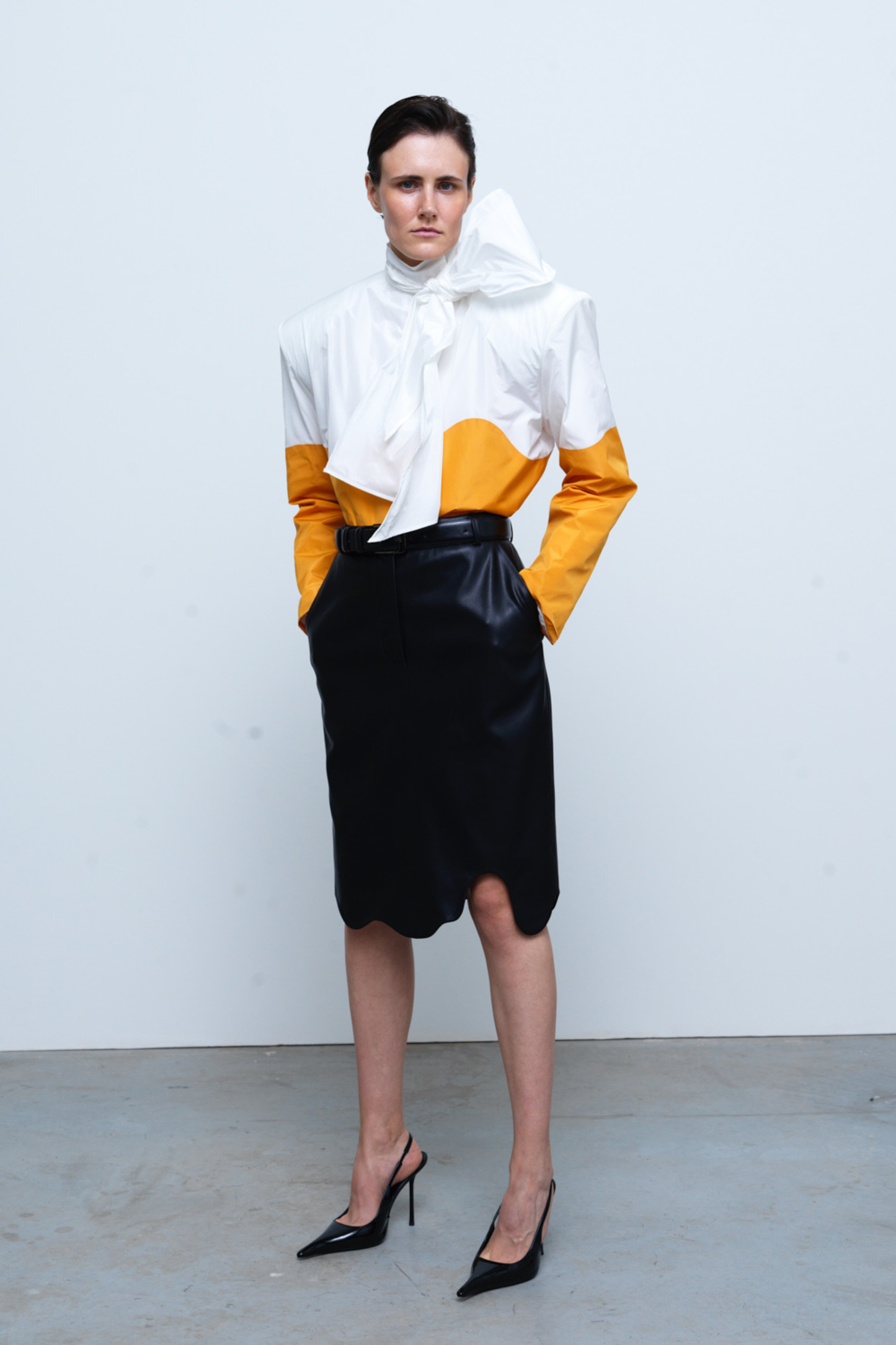SKIRT #03 — Faux Leather Wave Hem Midi Skirt GUDU