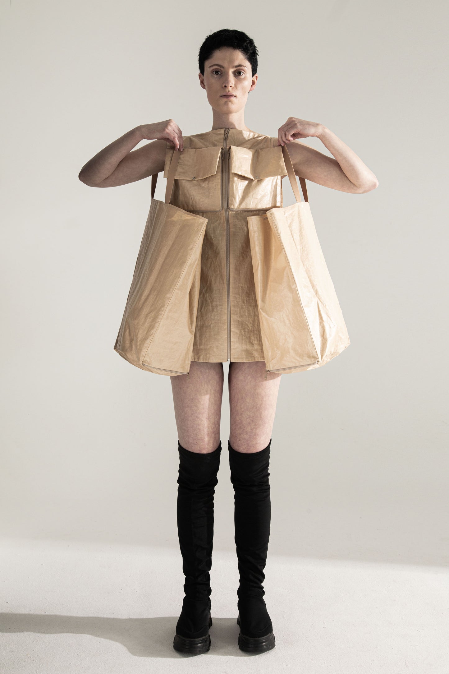 CONTAINER
5-way transforming piece: dress / vest DZHUS