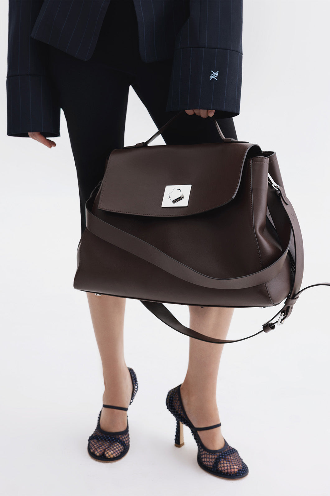 ERNESTINA 42 dark brown leather bag KACHOROVSKA side view showing structured silhouette and smooth leather texture