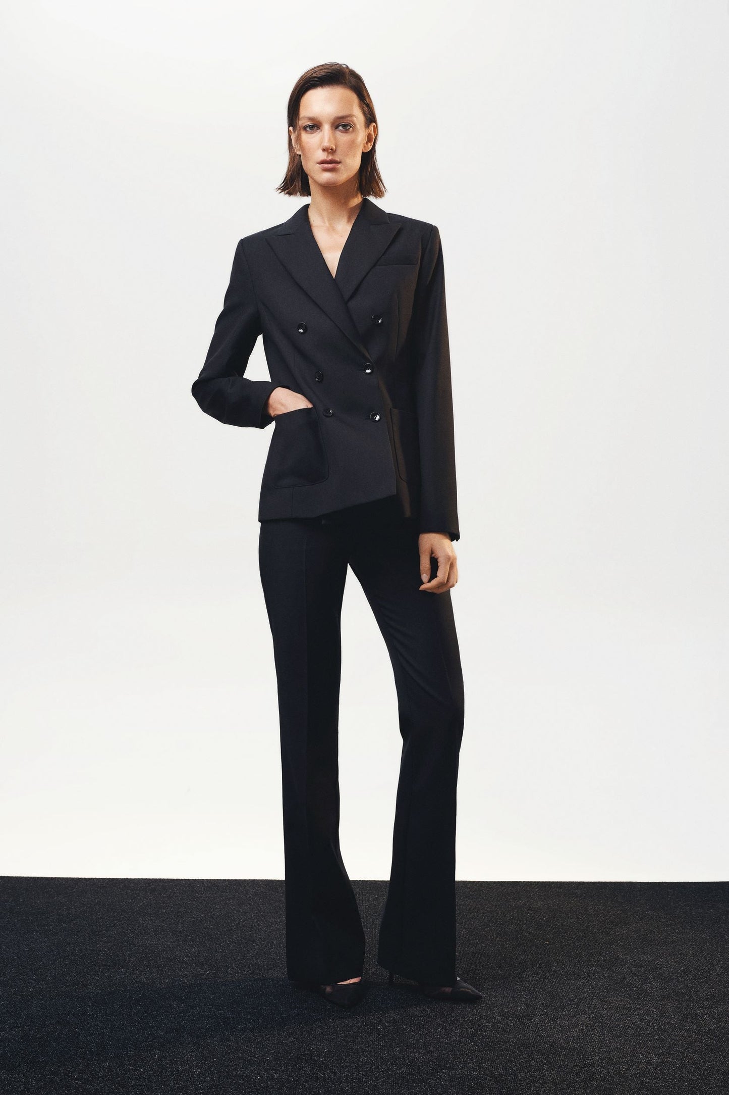 Black woolen flared trousers NOVITSKA