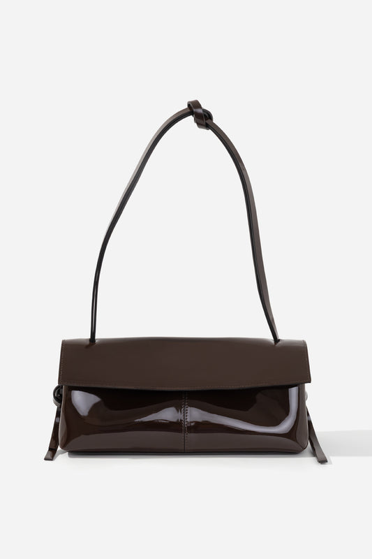 REBECCA BAGUETTE 29 dark brown patent leather bag KACHOROVSKA, top-down view with knot