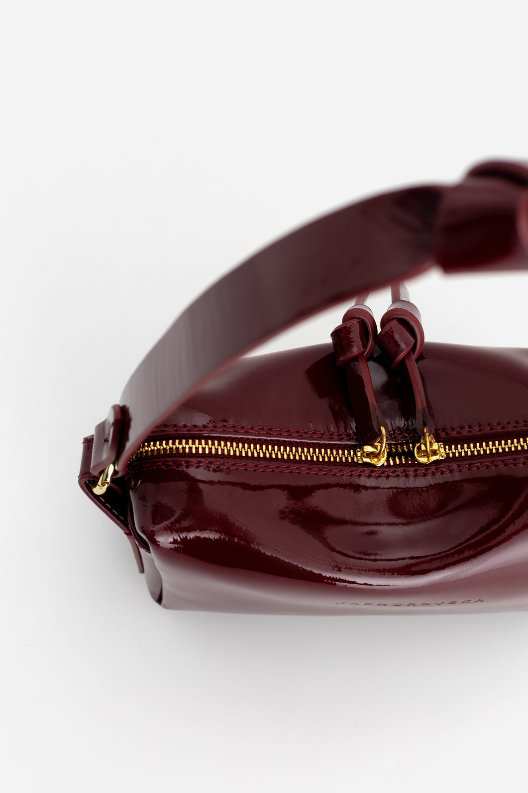 WINONA burgundy patent leather bag KACHOROVSKA, top-down view with knot