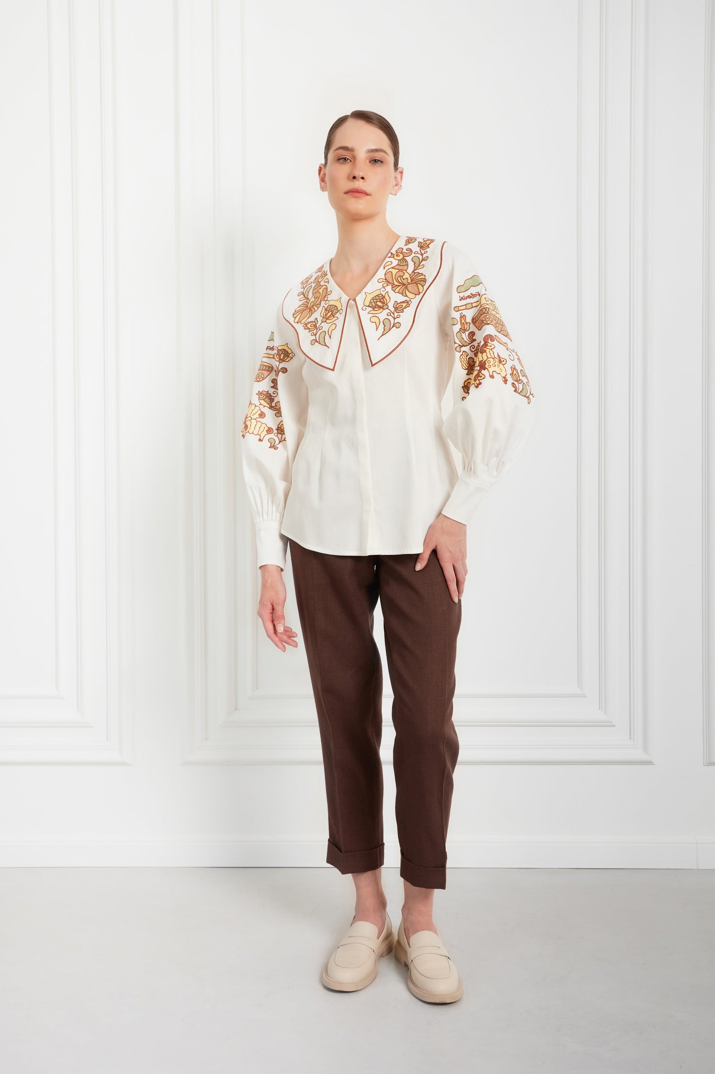 "Embroidery history" white blouse with colourful embroidery  FOBERINI