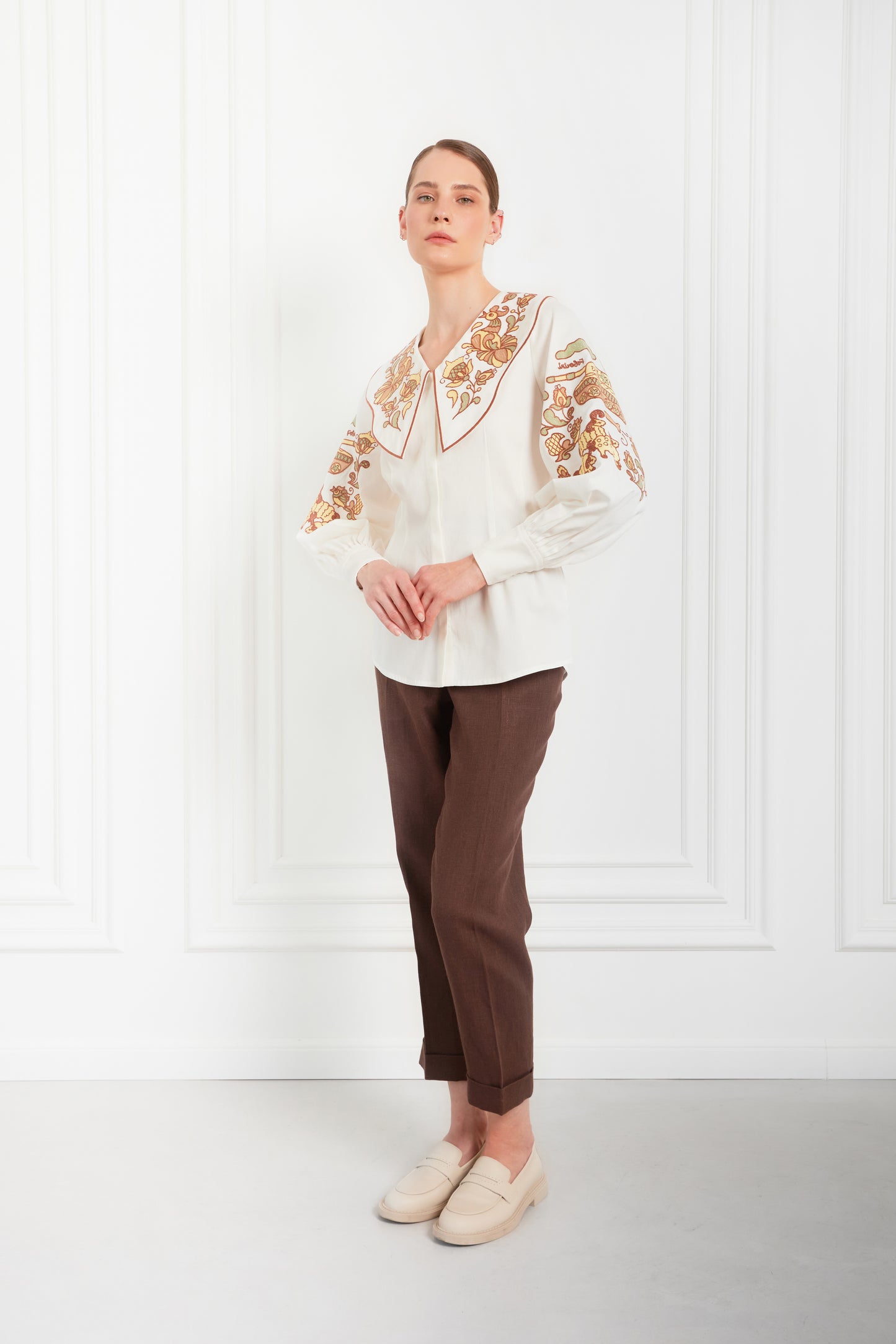 "Embroidery history" white blouse with colourful embroidery  FOBERINI