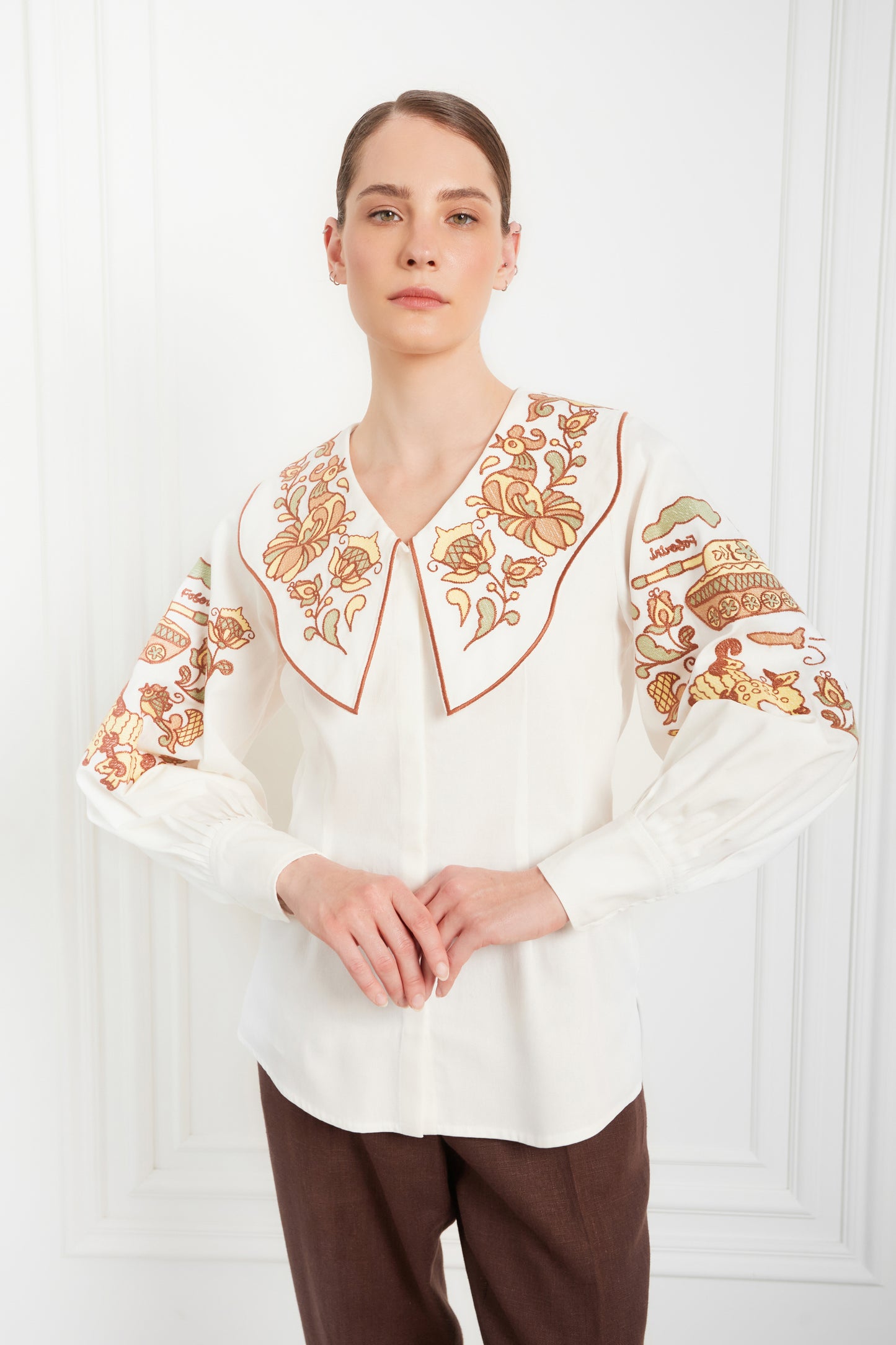 "Embroidery history" white blouse with colourful embroidery  FOBERINI